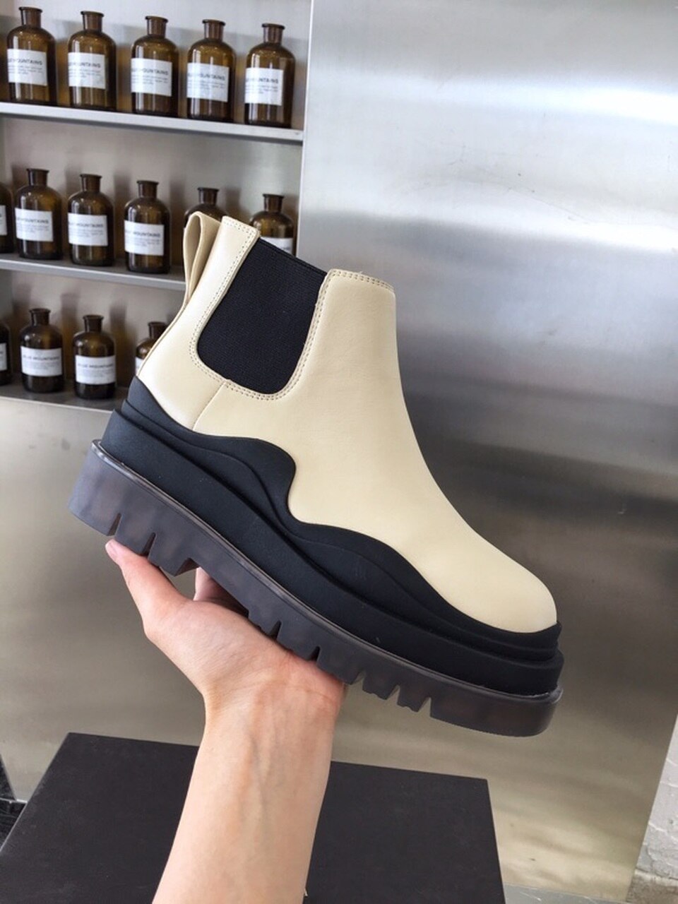 Bottega Veneta Flat Triple-Sole Leather Booties Calfskin Leather Fall/Winter 2020 Collection, Ivory/Black