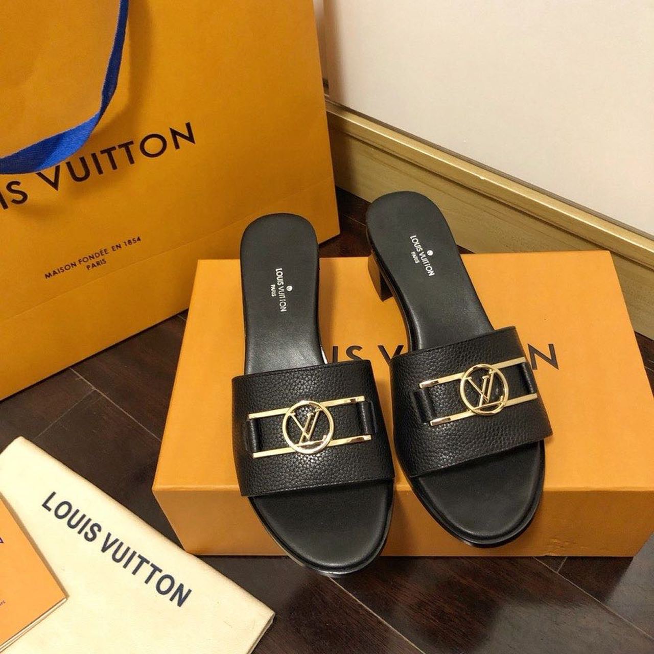 Louis Vuitton Lock It Flat Mules Calfskin Leather Spring/Summer Collection 1A64MN Black