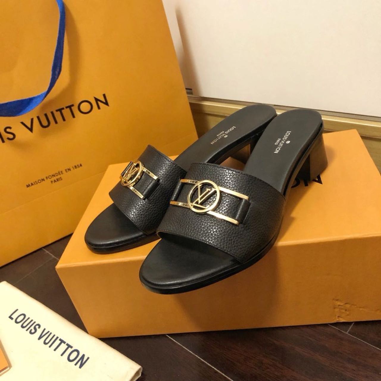 Louis Vuitton Lock It Flat Mules Calfskin Leather Spring/Summer Collection 1A64MN Black
