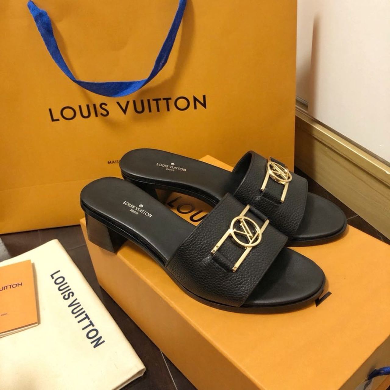 Louis Vuitton Lock It Flat Mules Calfskin Leather Spring/Summer Collection 1A64MN Black