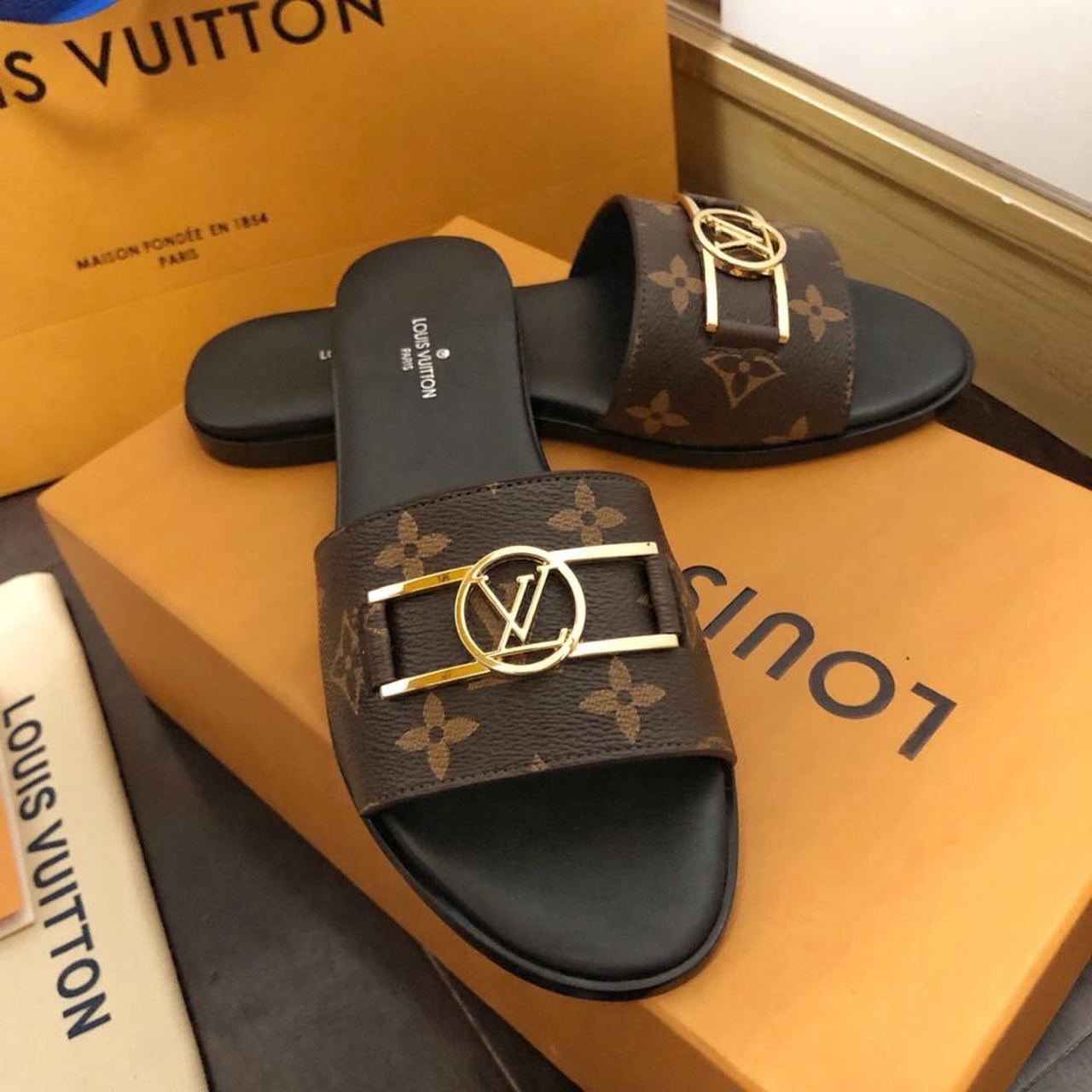 Louis Vuitton Lock It Flat Sandals Monogram Canvas Calfskin Leather Spring/Summer 2020 Collection 1A64MN Brown