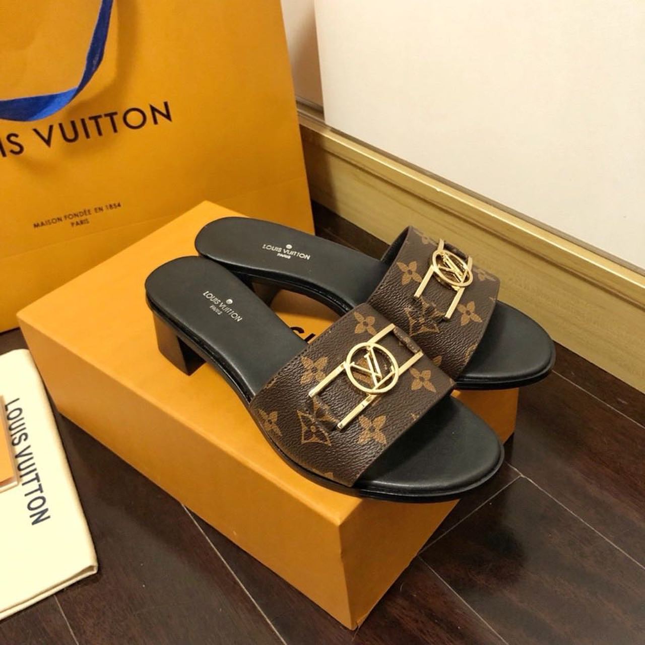 Louis Vuitton Lock It Flat Mules Monogram Canvas Calfskin Leather Spring/Summer 2020 Collection 1A64MN Brown