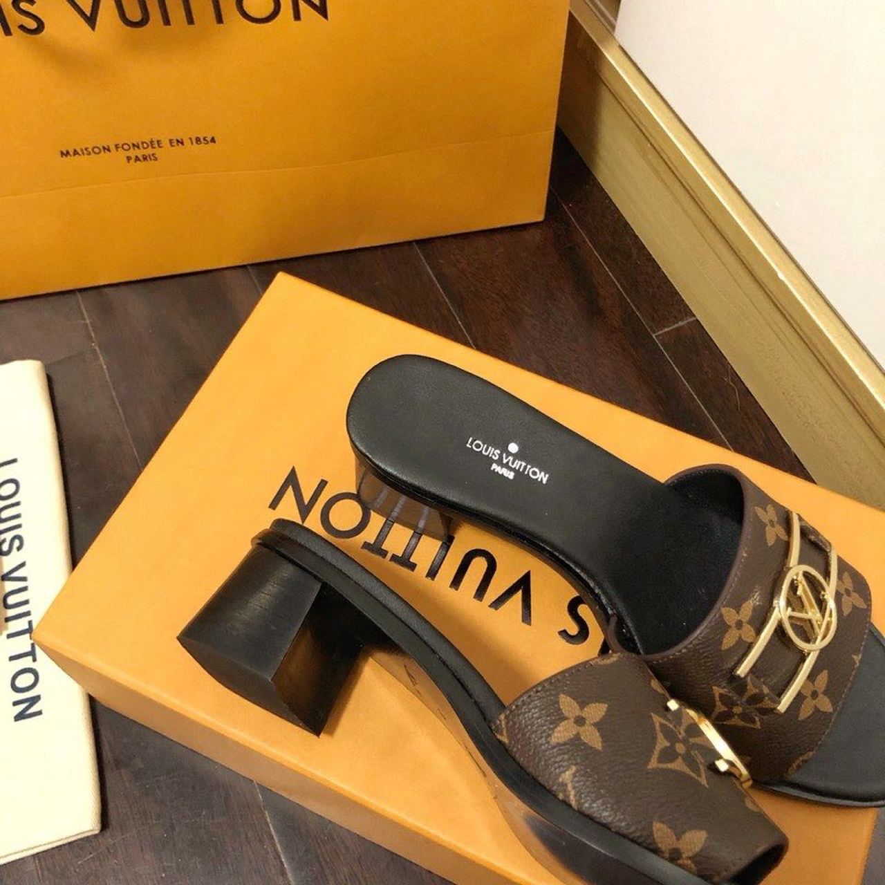 Louis Vuitton Lock It Flat Mules Monogram Canvas Calfskin Leather Spring/Summer 2020 Collection 1A64MN Brown
