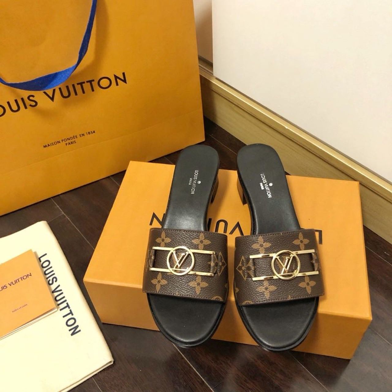 Louis Vuitton Lock It Flat Mules Monogram Canvas Calfskin Leather Spring/Summer 2020 Collection 1A64MN Brown