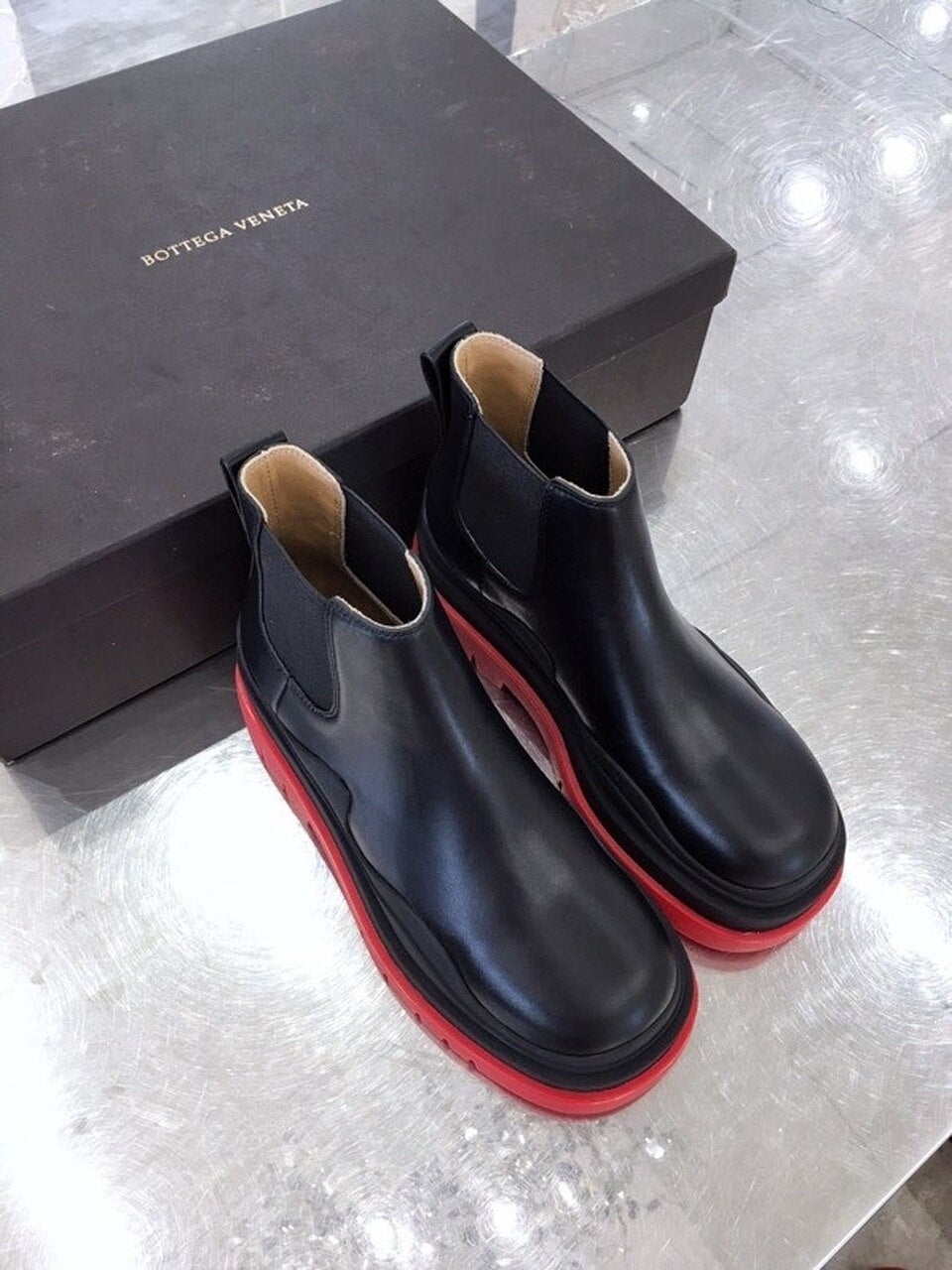 Bottega Veneta Flat Triple-Sole Leather Booties Calfskin Leather Fall/Winter 2020 Collection, Black/Red