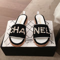 Chanel Woven Chain Cork Mules Sandals Tweed/Calfskin Leather Spring/Summer Collection Black/White