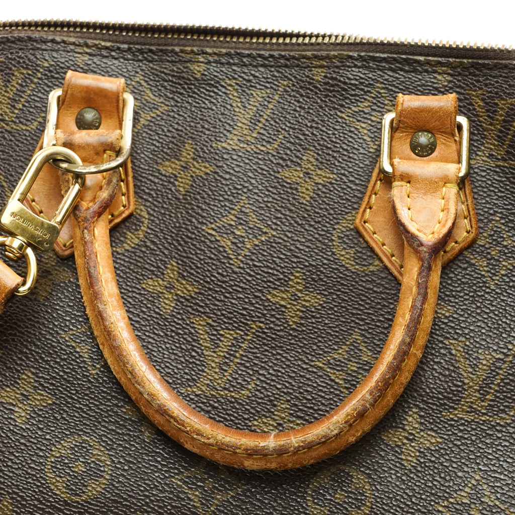 Louis Vuitton Alma Handbag