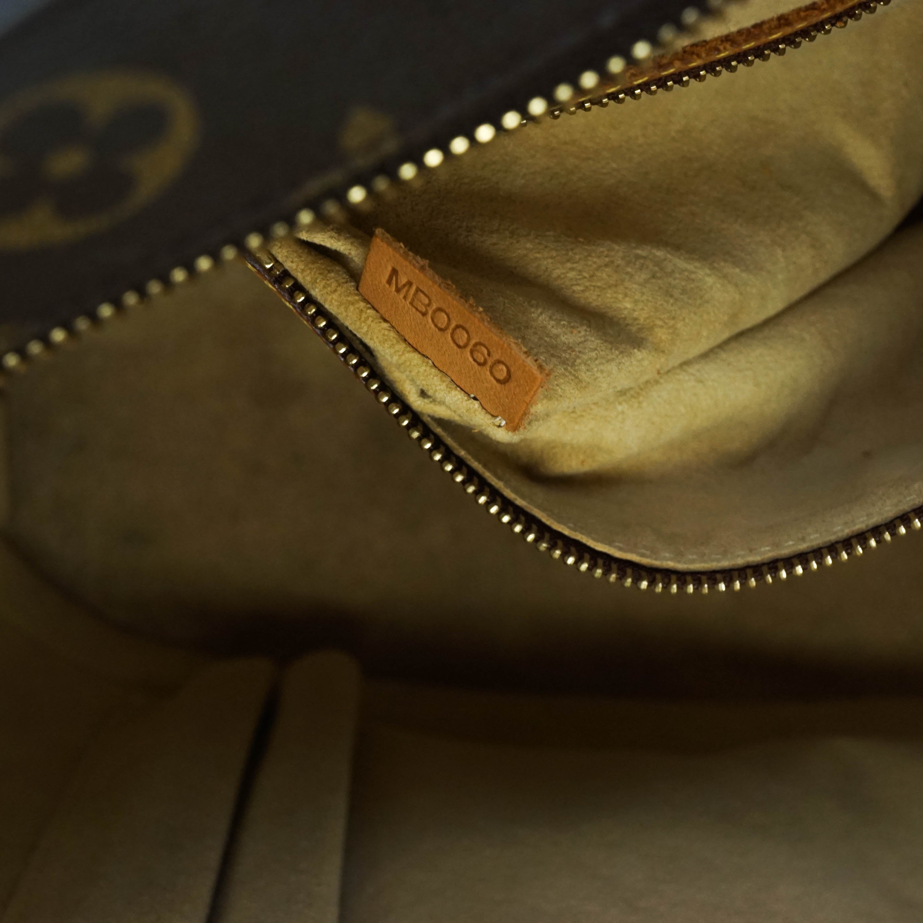 Louis Vuitton Babylone Tote Bag