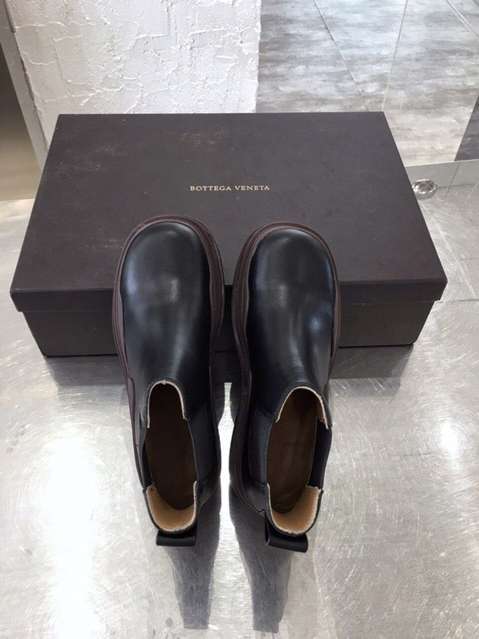 Bottega Veneta Flat Triple-Sole Leather Booties Calfskin Leather Fall/Winter 2020 Collection, Black/Brown