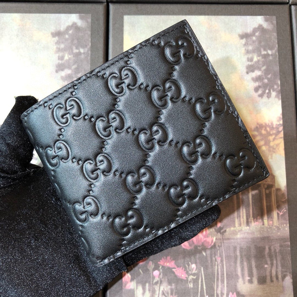 Gucci Embossed Bi-Fold Wallet 11cm