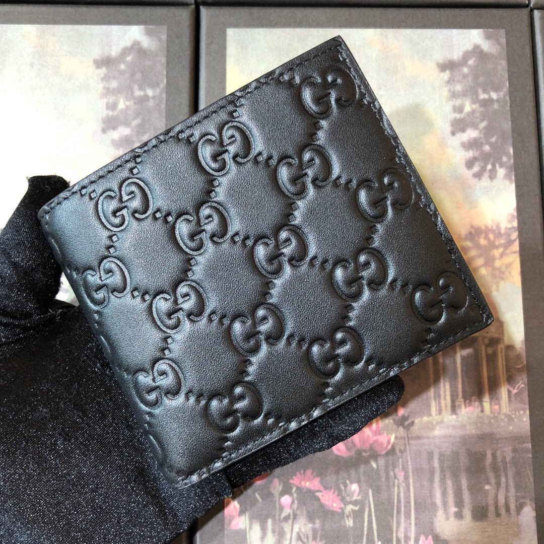 Gucci Embossed Bi-Fold Wallet 11cm