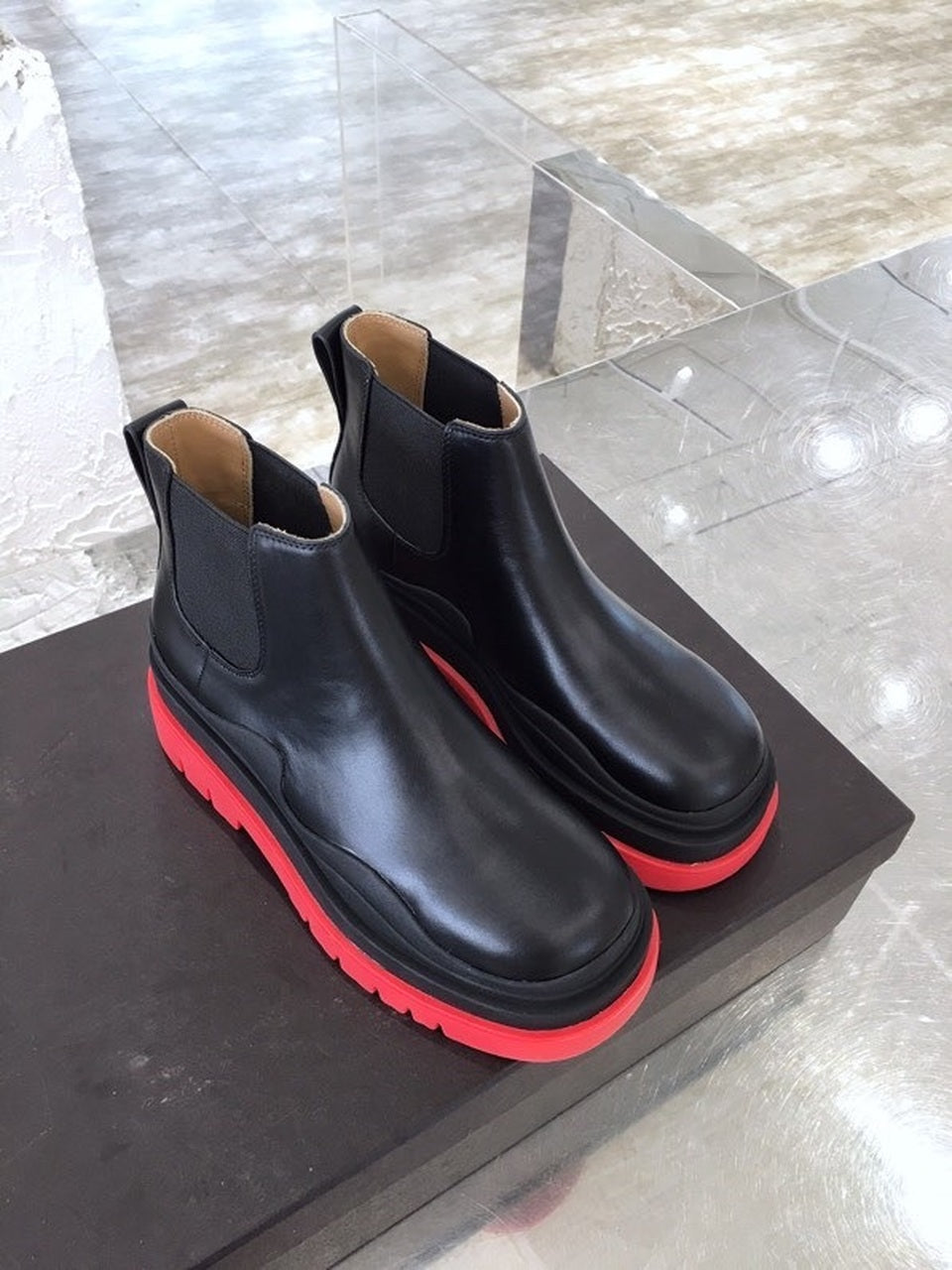 Bottega Veneta Flat Triple-Sole Leather Booties Calfskin Leather Fall/Winter 2020 Collection, Black/Red
