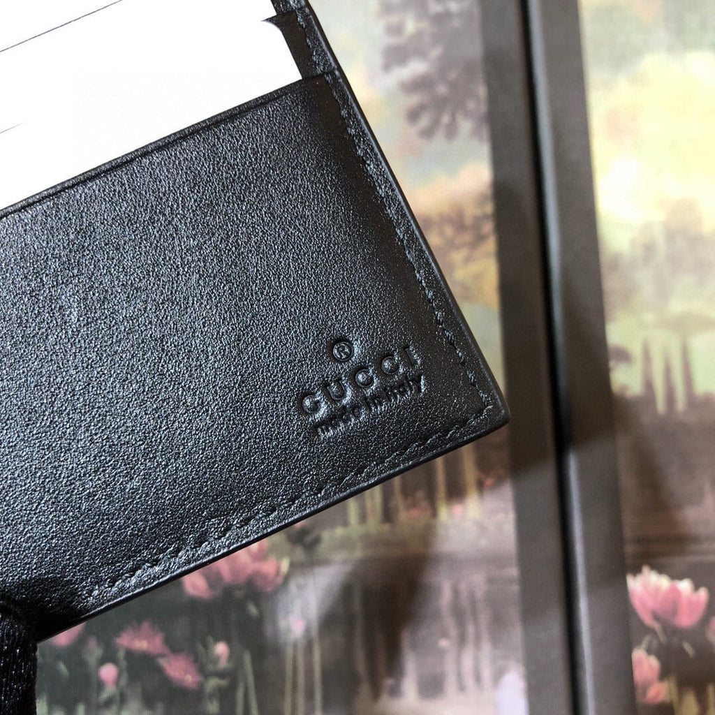 Gucci Embossed Bi-Fold Wallet 11cm
