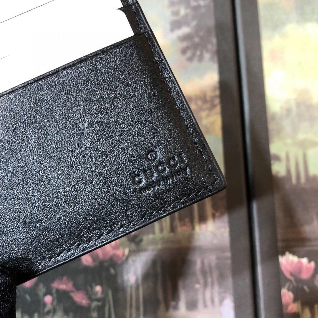 Gucci Embossed Bi-Fold Wallet 11cm