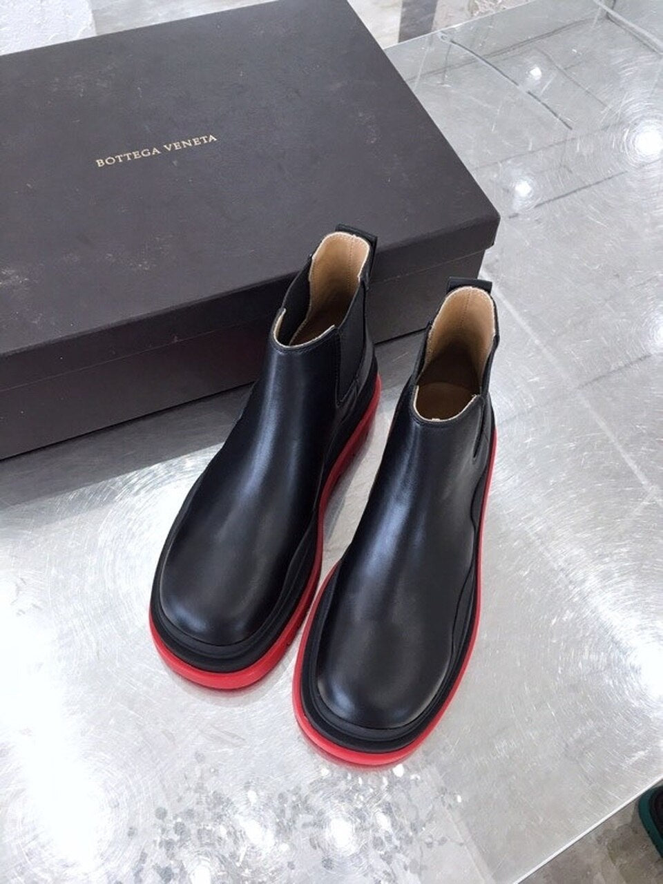 Bottega Veneta Flat Triple-Sole Leather Booties Calfskin Leather Fall/Winter 2020 Collection, Black/Red
