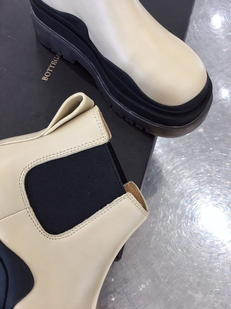 Bottega Veneta Flat Triple-Sole Leather Booties Calfskin Leather Fall/Winter 2020 Collection, Ivory/Black