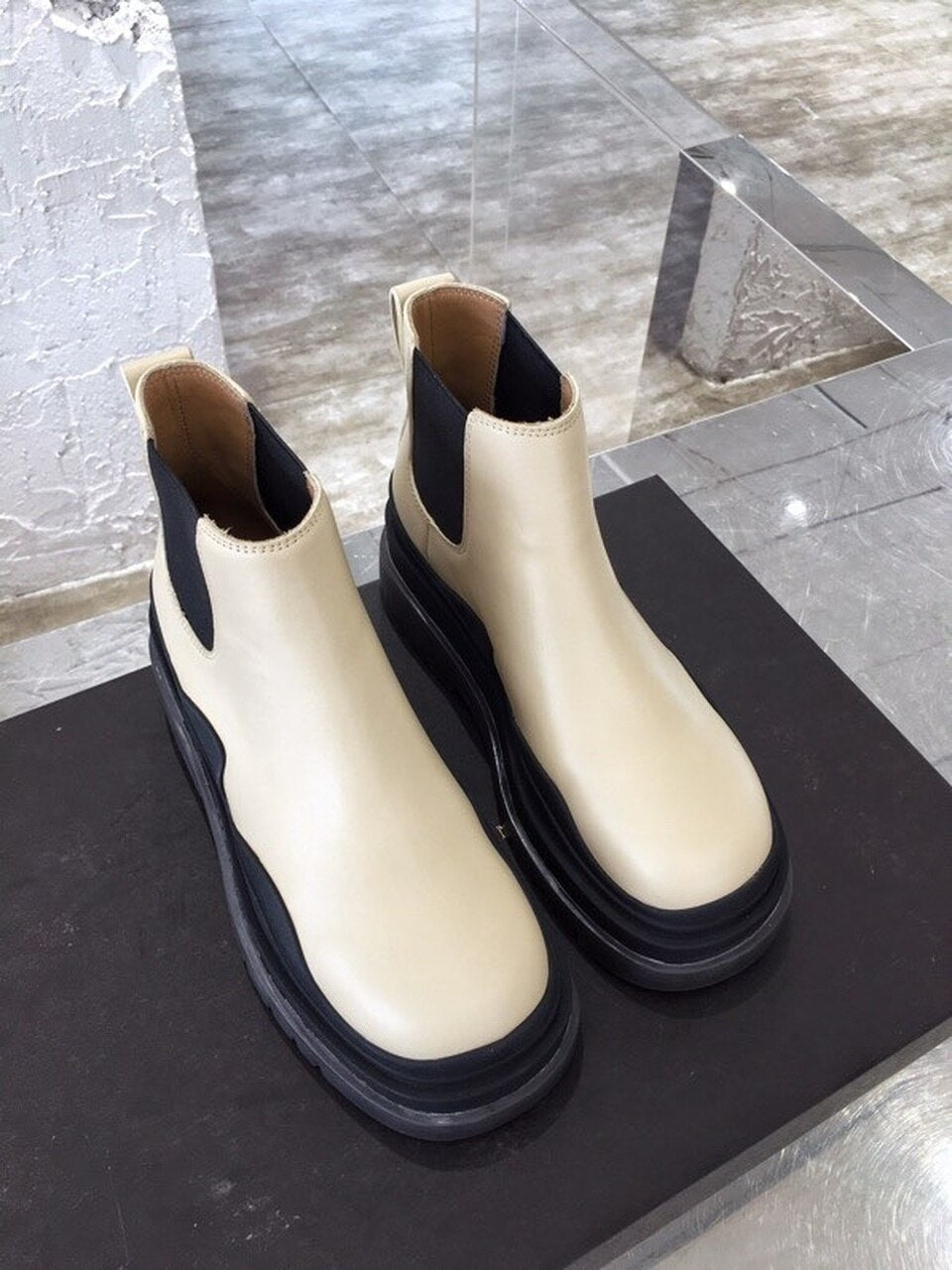 Bottega Veneta Flat Triple-Sole Leather Booties Calfskin Leather Fall/Winter 2020 Collection, Ivory/Black