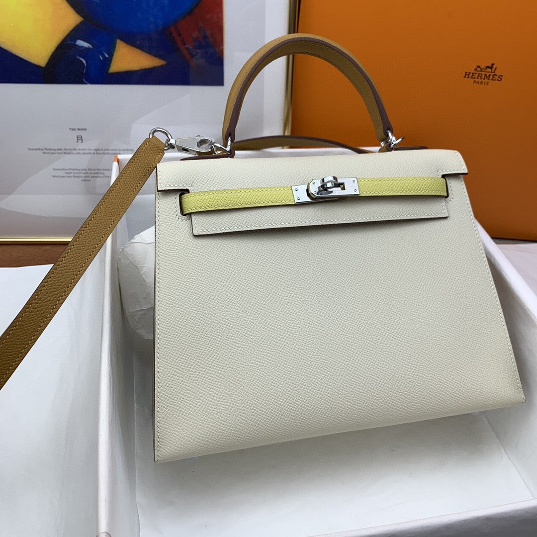 Hermes Kelly 25 Togo Silver Hardware White