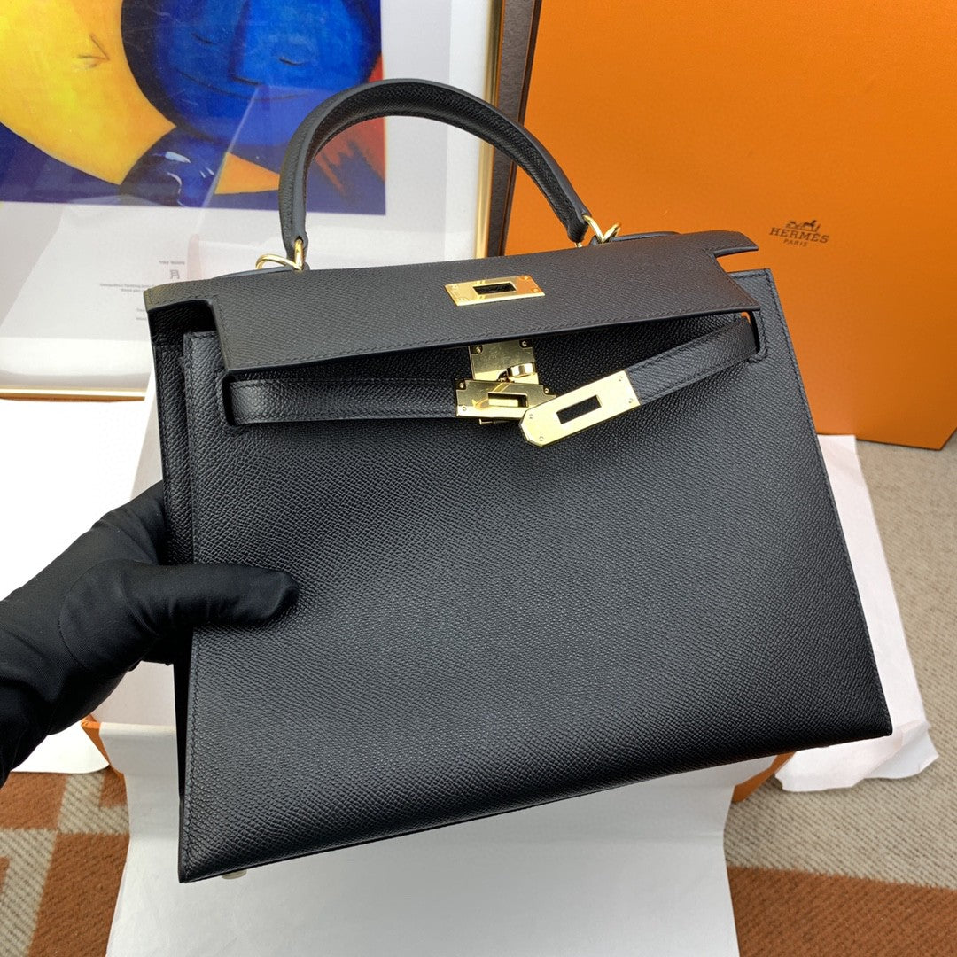 Hermes Kelly 28 Togo Gold Hardware Black