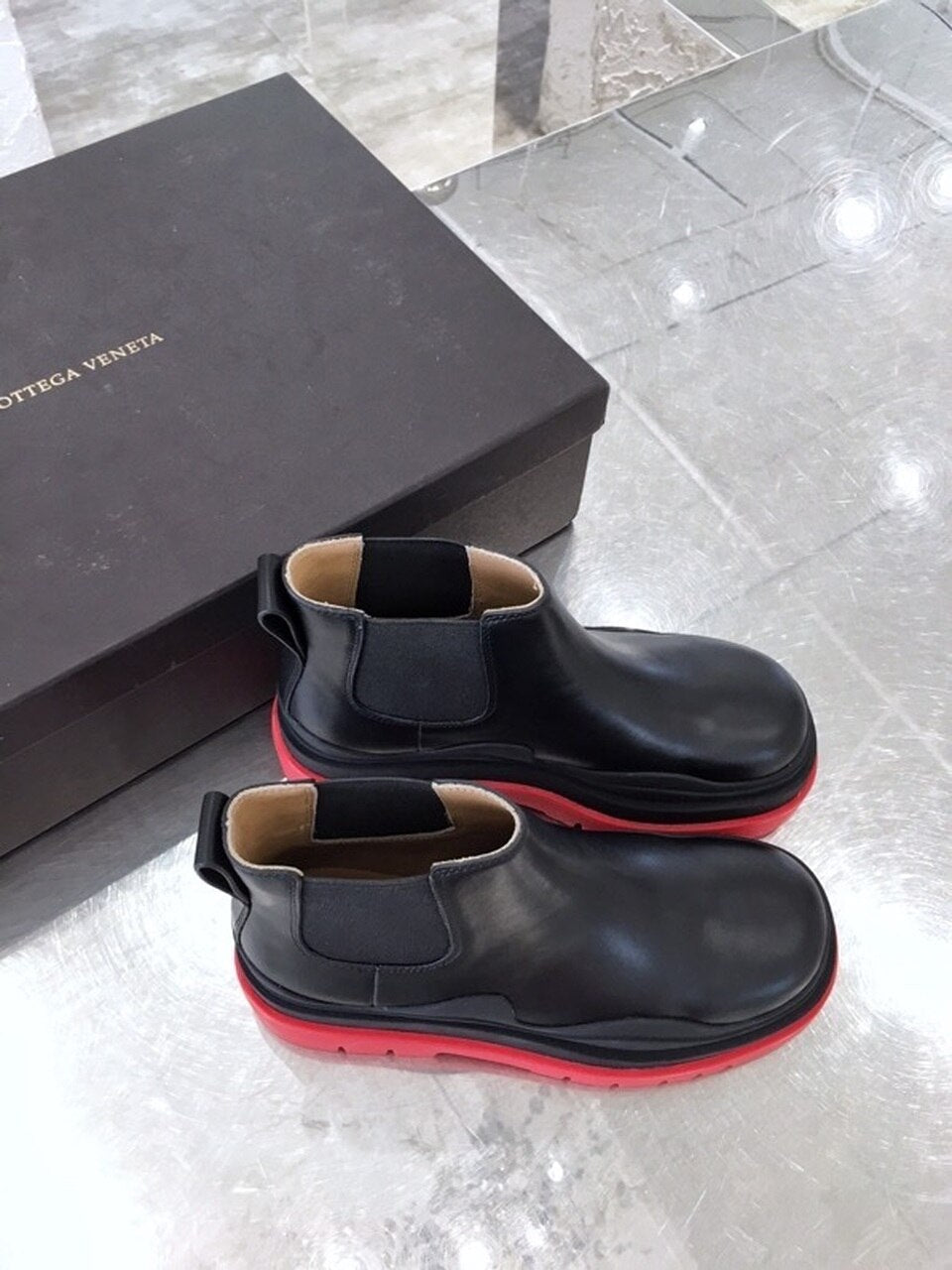 Bottega Veneta Flat Triple-Sole Leather Booties Calfskin Leather Fall/Winter 2020 Collection, Black/Red