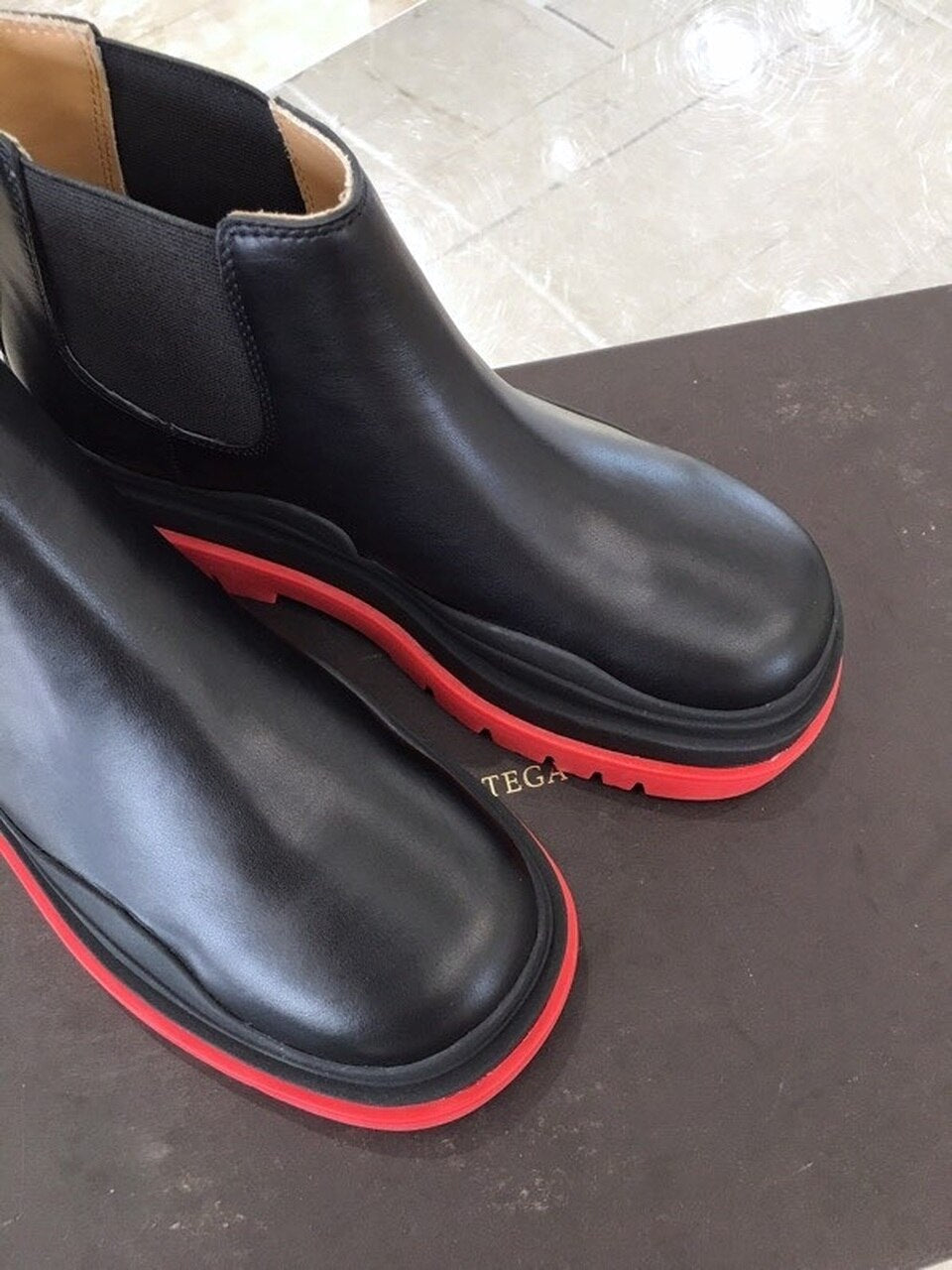 Bottega Veneta Flat Triple-Sole Leather Booties Calfskin Leather Fall/Winter 2020 Collection, Black/Red