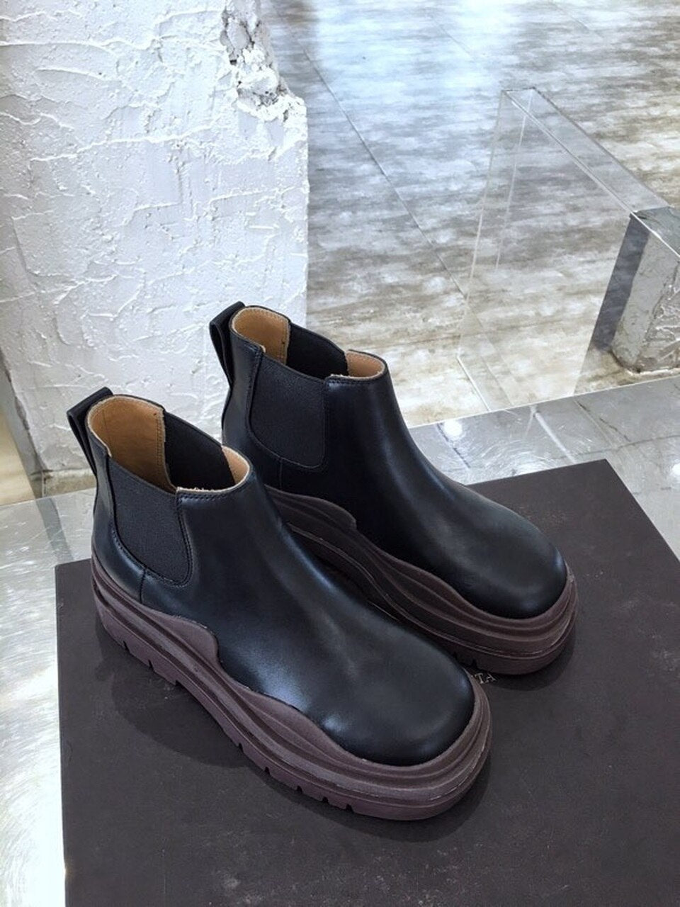Bottega Veneta Flat Triple-Sole Leather Booties Calfskin Leather Fall/Winter 2020 Collection, Black/Brown