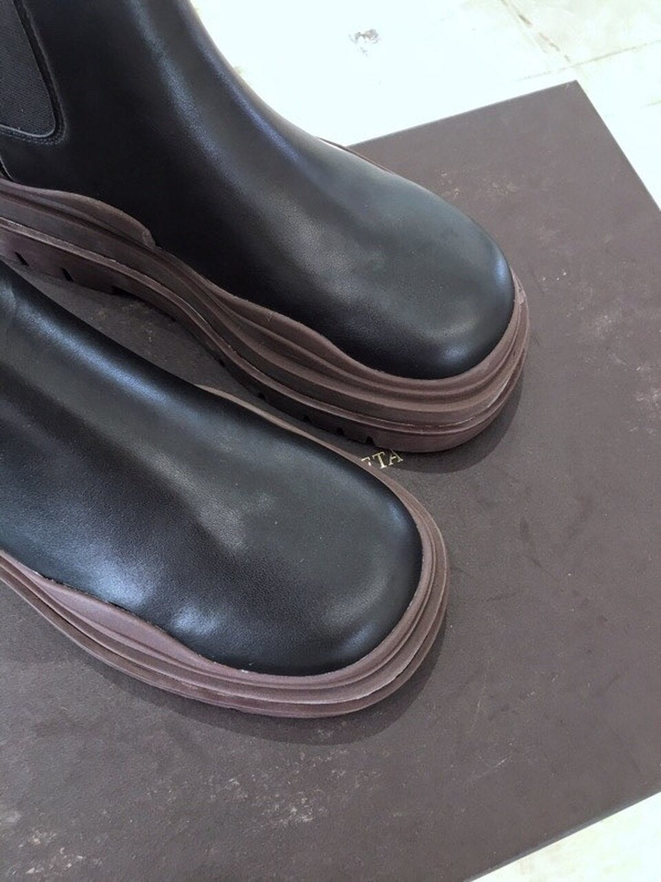 Bottega Veneta Flat Triple-Sole Leather Booties Calfskin Leather Fall/Winter 2020 Collection, Black/Brown