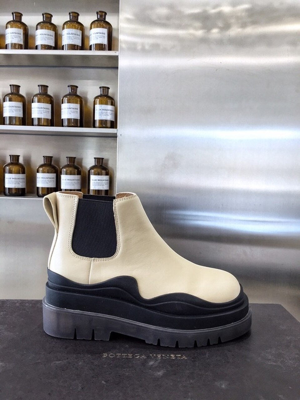 Bottega Veneta Flat Triple-Sole Leather Booties Calfskin Leather Fall/Winter 2020 Collection, Ivory/Black
