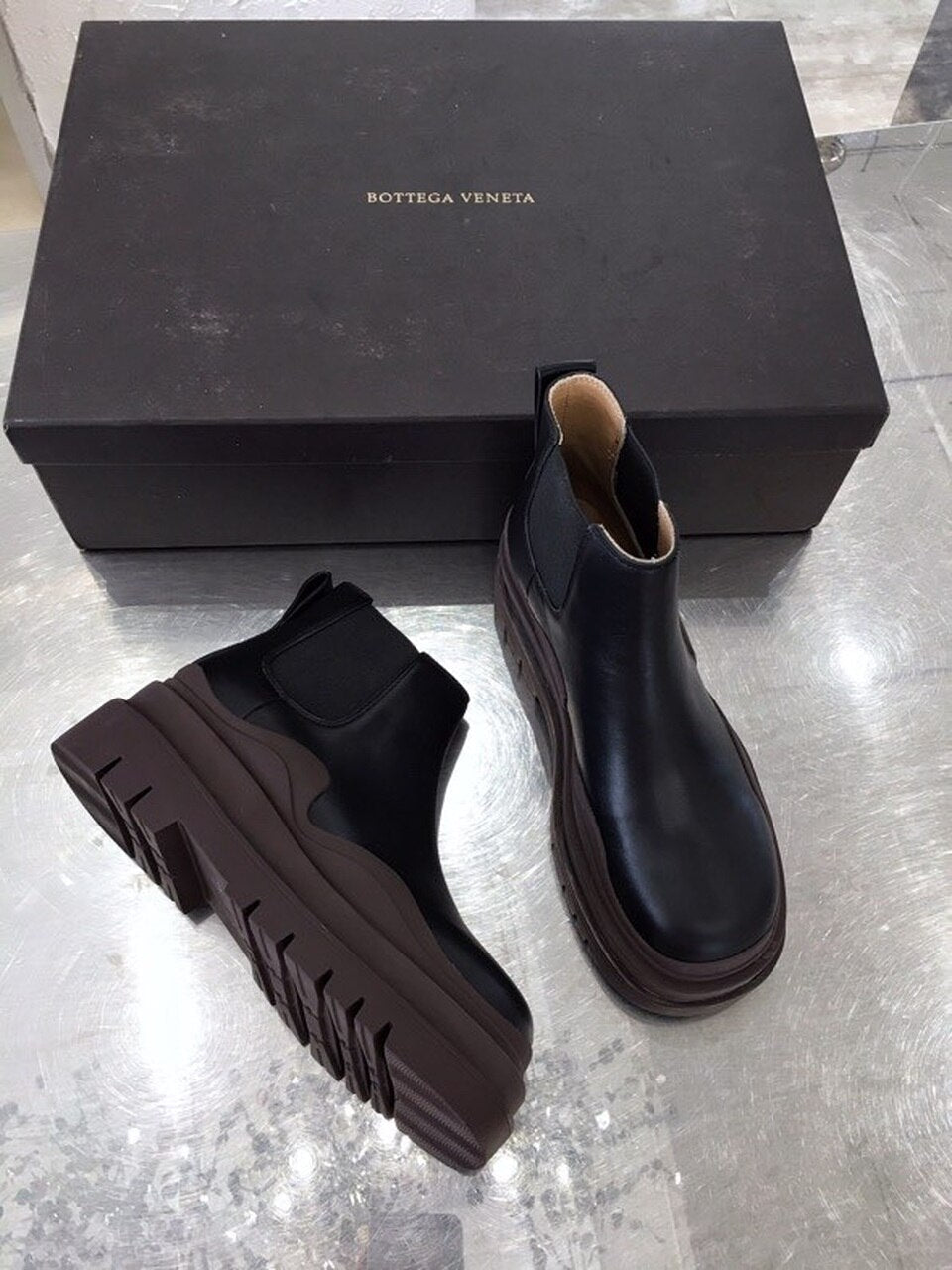Bottega Veneta Flat Triple-Sole Leather Booties Calfskin Leather Fall/Winter 2020 Collection, Black/Brown