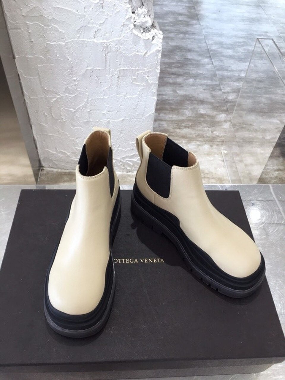 Bottega Veneta Flat Triple-Sole Leather Booties Calfskin Leather Fall/Winter 2020 Collection, Ivory/Black