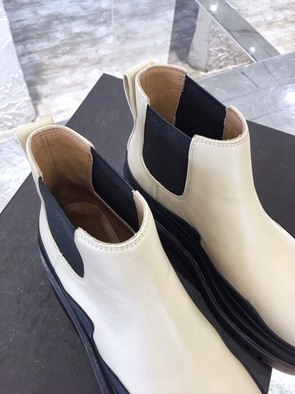 Bottega Veneta Flat Triple-Sole Leather Booties Calfskin Leather Fall/Winter 2020 Collection, Ivory/Black