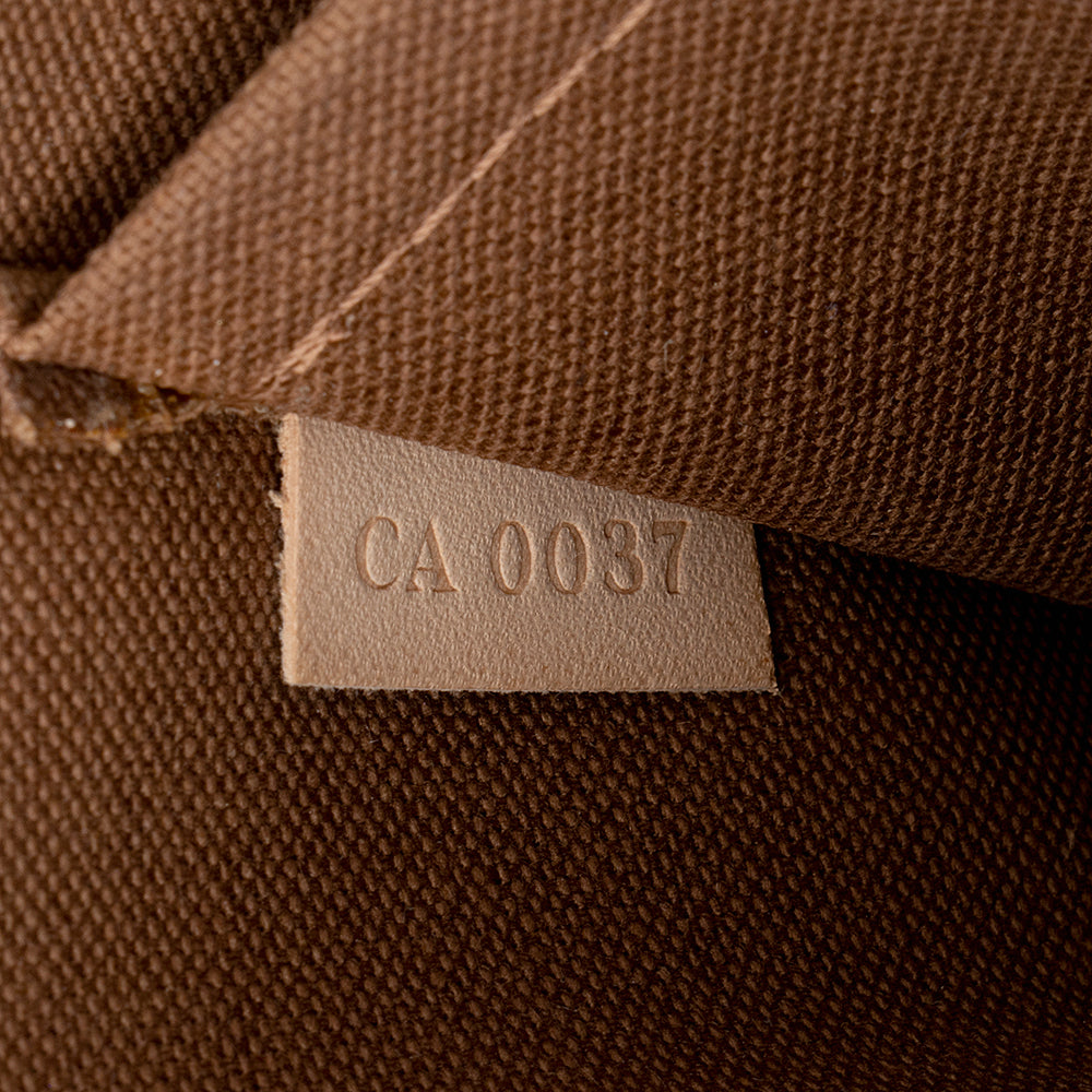 Louis Vuitton Limited Edition Monogram Canvas Riveting Pochette Accessoires (SHF-18325)