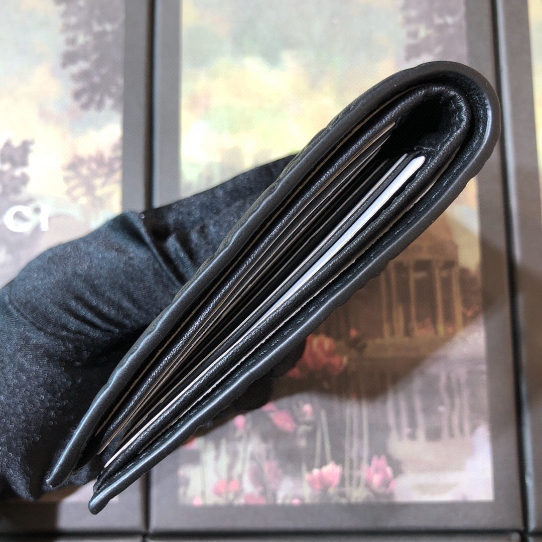 Gucci Embossed Bi-Fold Wallet 11cm