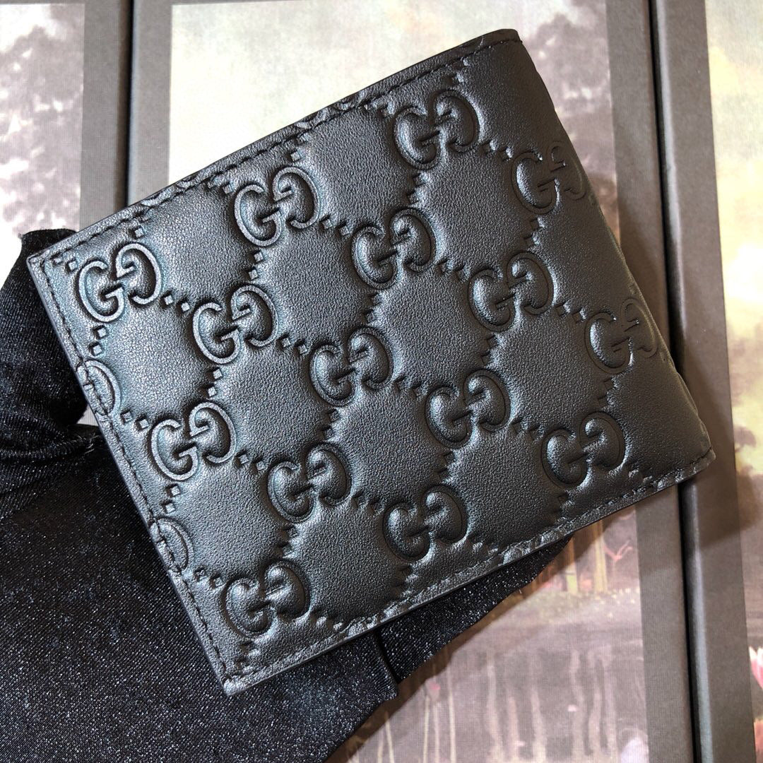 Gucci Embossed Bi-Fold Wallet 11cm