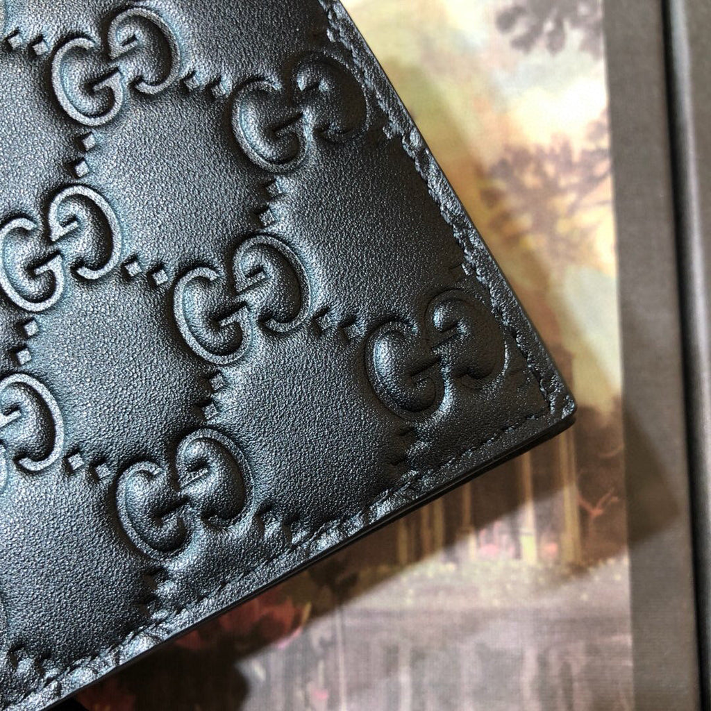 Gucci Embossed Bi-Fold Wallet 11cm