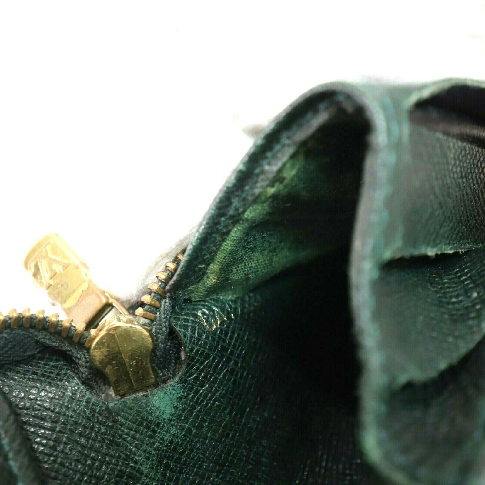 Louis Vuitton Taiga Bifold Zip