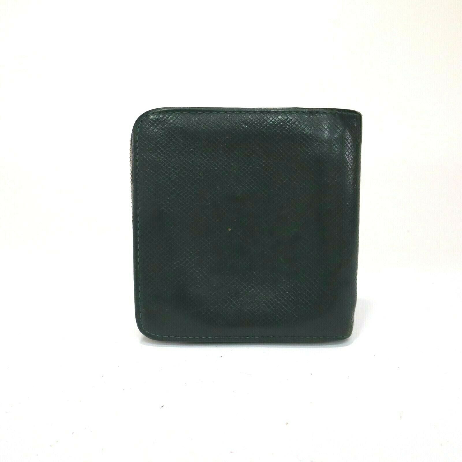 Louis Vuitton Taiga Bifold Zip