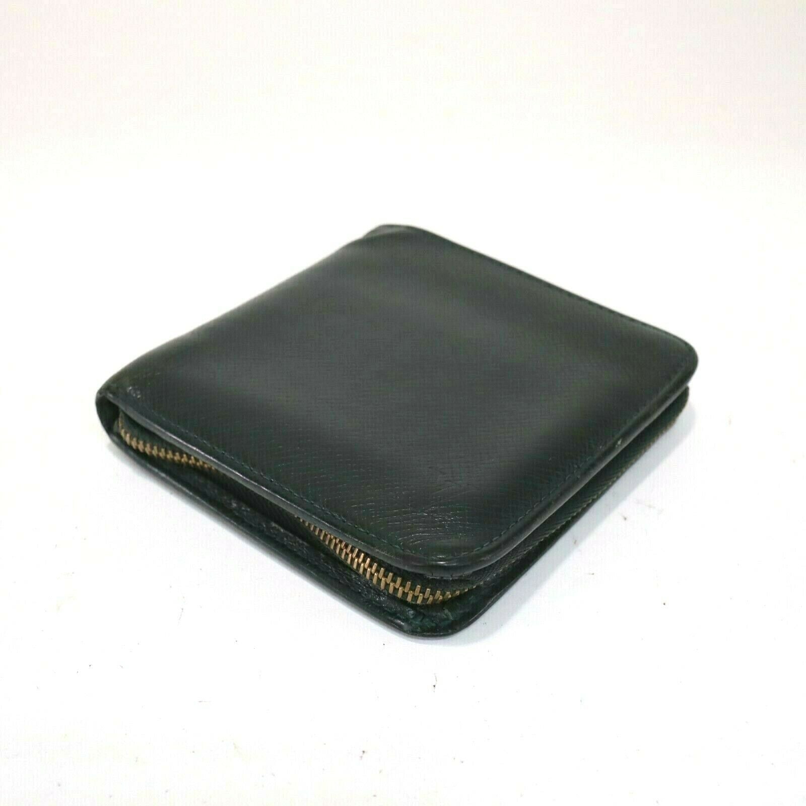 Louis Vuitton Taiga Bifold Zip