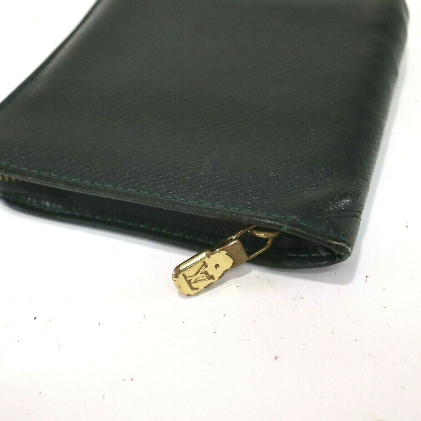 Louis Vuitton Taiga Bifold Zip
